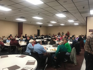 A full dining hall enjoying the annual Fish Fry