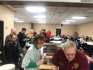Lions members on the serving line at the 2019 Fish Fry