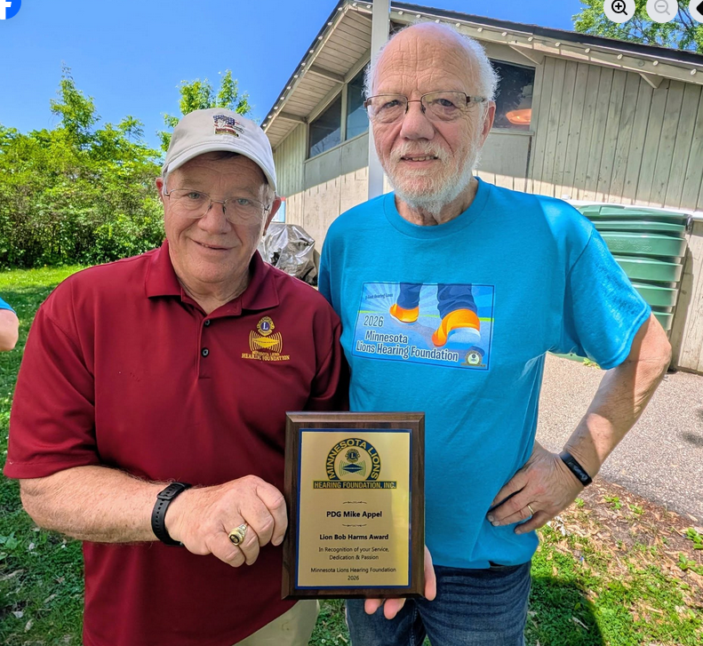 PDG Mike Appel receives the Lion Bob Harms Award from the MN Lions Hearing Foundation